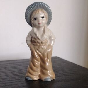 Vintage Charming Ceramic Figurine Pioneer Girl with Blue Hat and Tan Outfit